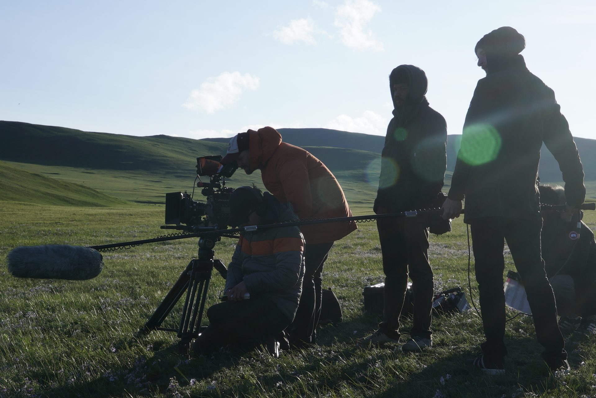 MediaCrackers film crew shooting on the Mongolian steppe at golden hour
